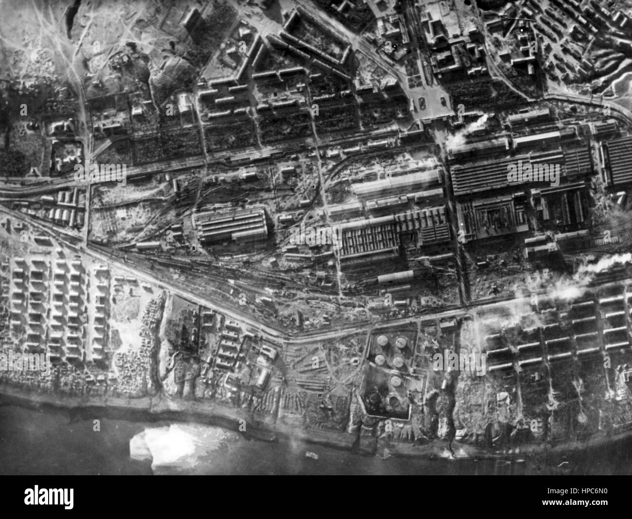 Aerial view on major tank factory Dzerzhinsky in Stalingrad, Soviet Union, released 17 October 1942. The original photography from which this digital image was made reads on its backside the national-socialistic propaganda 'Great tank factory Dzerzhinsky. One of the most important defence facilities of the Soviets in the fiercly fought-over Stalingrad was tractor factory Dzerzhinsky, which produced the finest Soviet tanks during times of peace and was turned into a factory for building tanks since outbreak of the war. The factory was turned into a massive bastion and was defended by the Bolshe Stock Photo