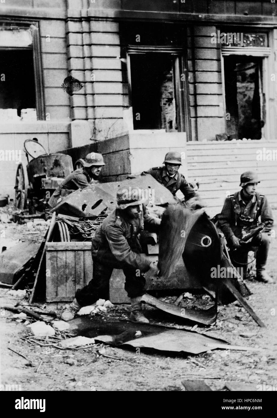 Soldiers of German Wehrmacht operate an anti-tank gun in the Battle of ...