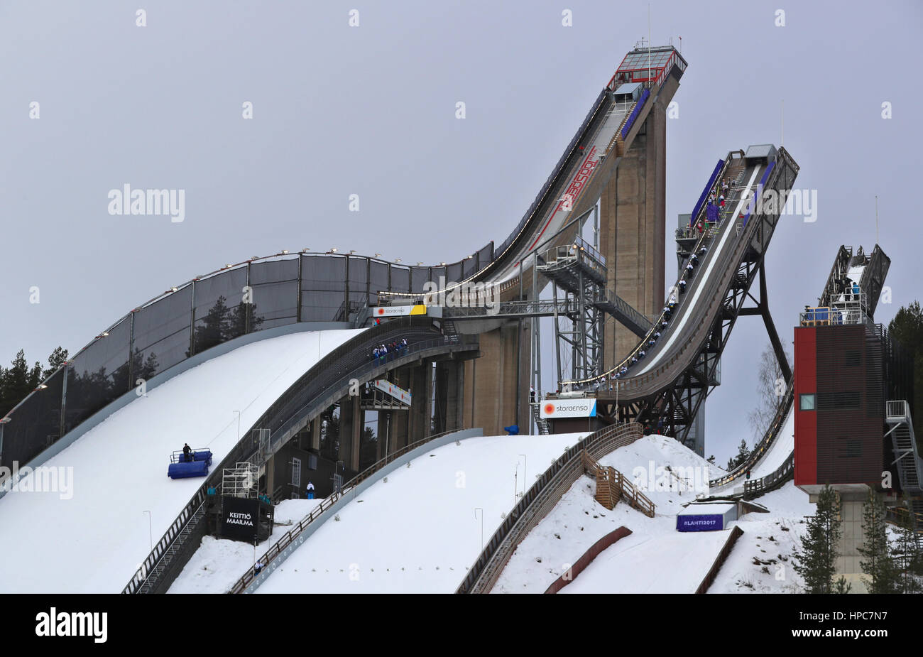 Lahti, Finland. 21st Feb, 2017. A helper finishes the large ski jump with a roller ahead of the Nordic World Ski Championships in Lahti, Finland, 21 February 2017. The World Championships run from 22 February to 05 March 2017. Photo: Karl-Josef Hildenbrand/dpa/Alamy Live News Stock Photo