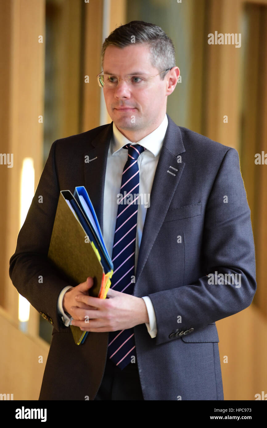 Edinburgh, Scotland, UK. 21st February 2017. Scottish Finance Secretary Derek Mackay on his way to the chamber of the Scottish Parliament to lead the debate on setting Scottish income rates for the first time in 300 years, under newly devolved powers Credit: Ken Jack/Alamy Live News Stock Photo