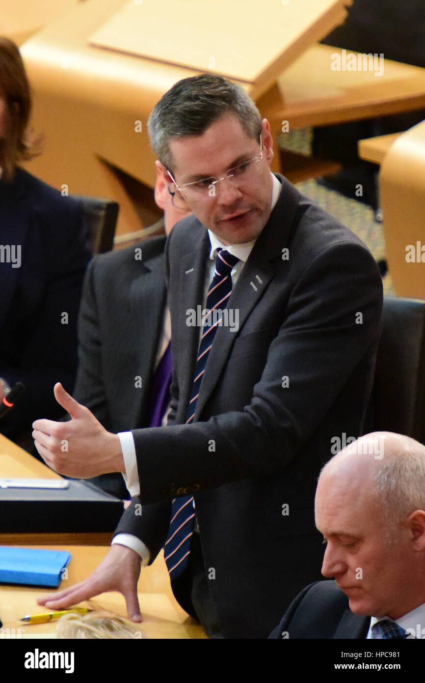 Edinburgh, Scotland, UK. 21st February 2017. Scottish Finance Secretary Derek Mackay leads the debate in the Scottish Parliament on setting Scottish income rates for the first time in 300 years, under newly devolved powers, Credit: Ken Jack/Alamy Live News Stock Photo