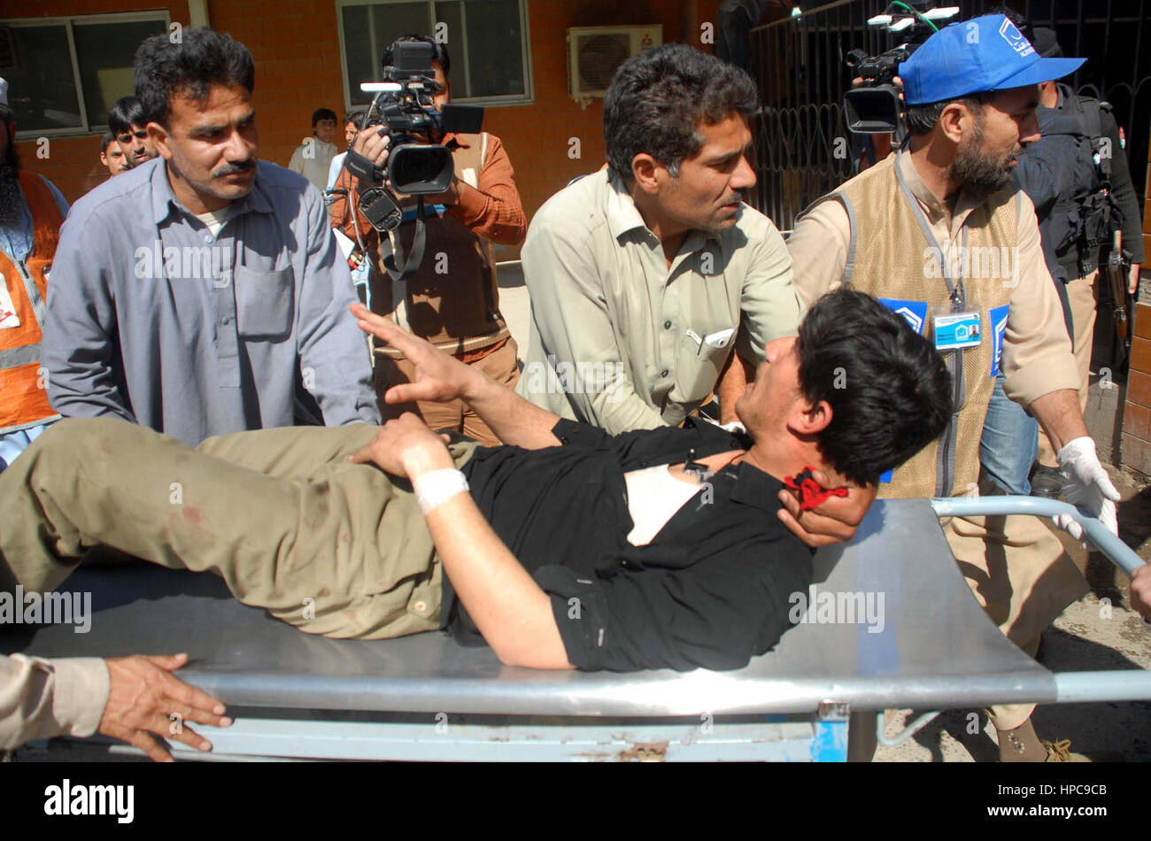 Injured victims of suicide bomb explosions that occurred at a local court building in Charsadda, being shifting for treatment to Lady Reading Hospital in Peshawar on Tuesday, February 21, 2017. Security forces killed three suicide attackers who attempted to wreak havoc at a local court in Charsadda district. Six people, including four policemen, were martyred and 20 others were injured. Stock Photo