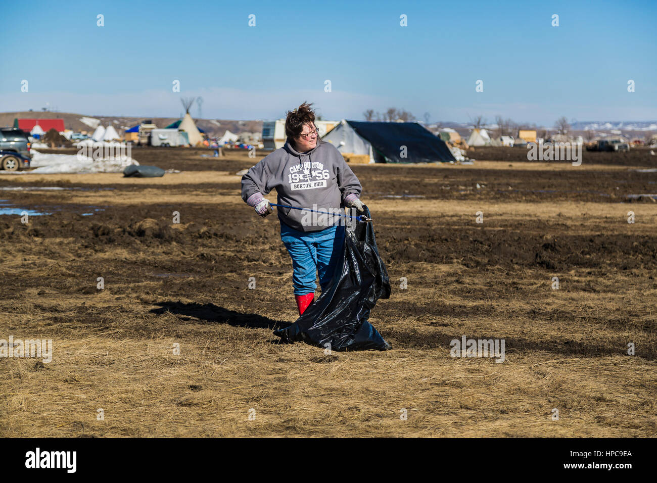 On February 20, 2017, water protectors in Standing Rock, North Dakota, continued their cleanup effort and attempted to negotiate an extension from being evicted from the Oceti Sakowin Camp, but were told by the Army Corps of Engineers that the notice of eviction would not change.   Hundreds of militarized law enforcement from various agencies, including The US National Guard and Homeland Security, will reportedly raid the camp at 2 p.m. on Wednesday, February 22, 2017 and will arrest all water protectors who refuse to leave.   Photo: Cronos/Michael Nigro Stock Photo