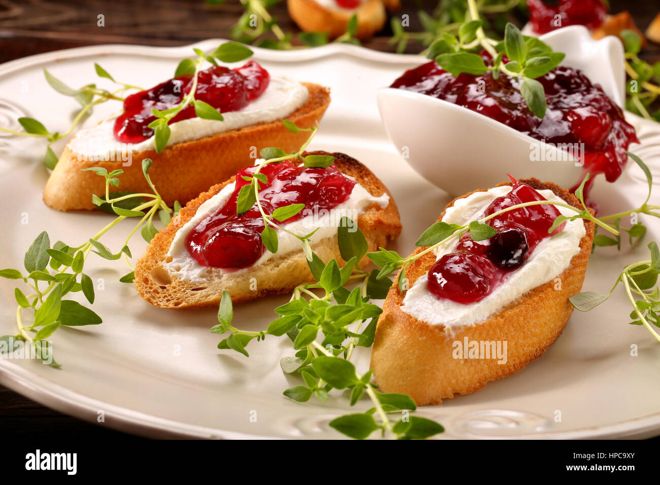Toast with cottage cheese and cranberry jam Stock Photo Alamy