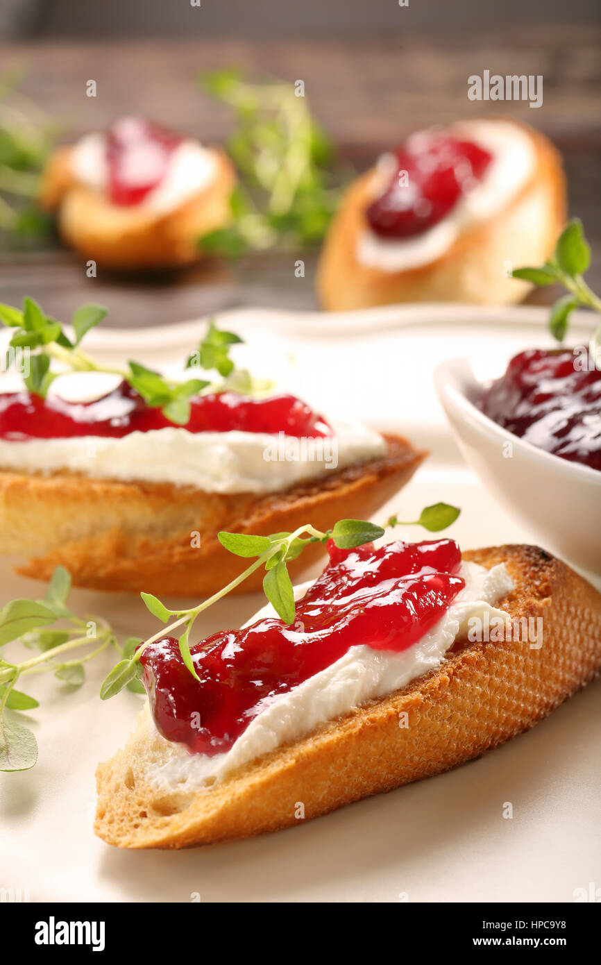 Toast with cottage cheese and cranberry jam Stock Photo Alamy