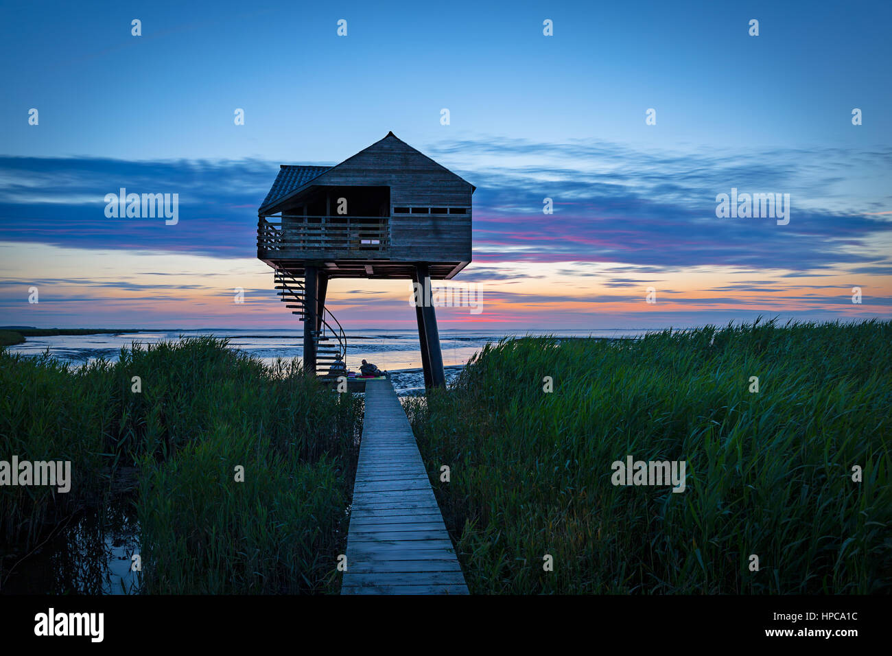 A wooden house for birdwatching on the border of Germany and Netherlands near Nieuwe Statenzijl Stock Photo