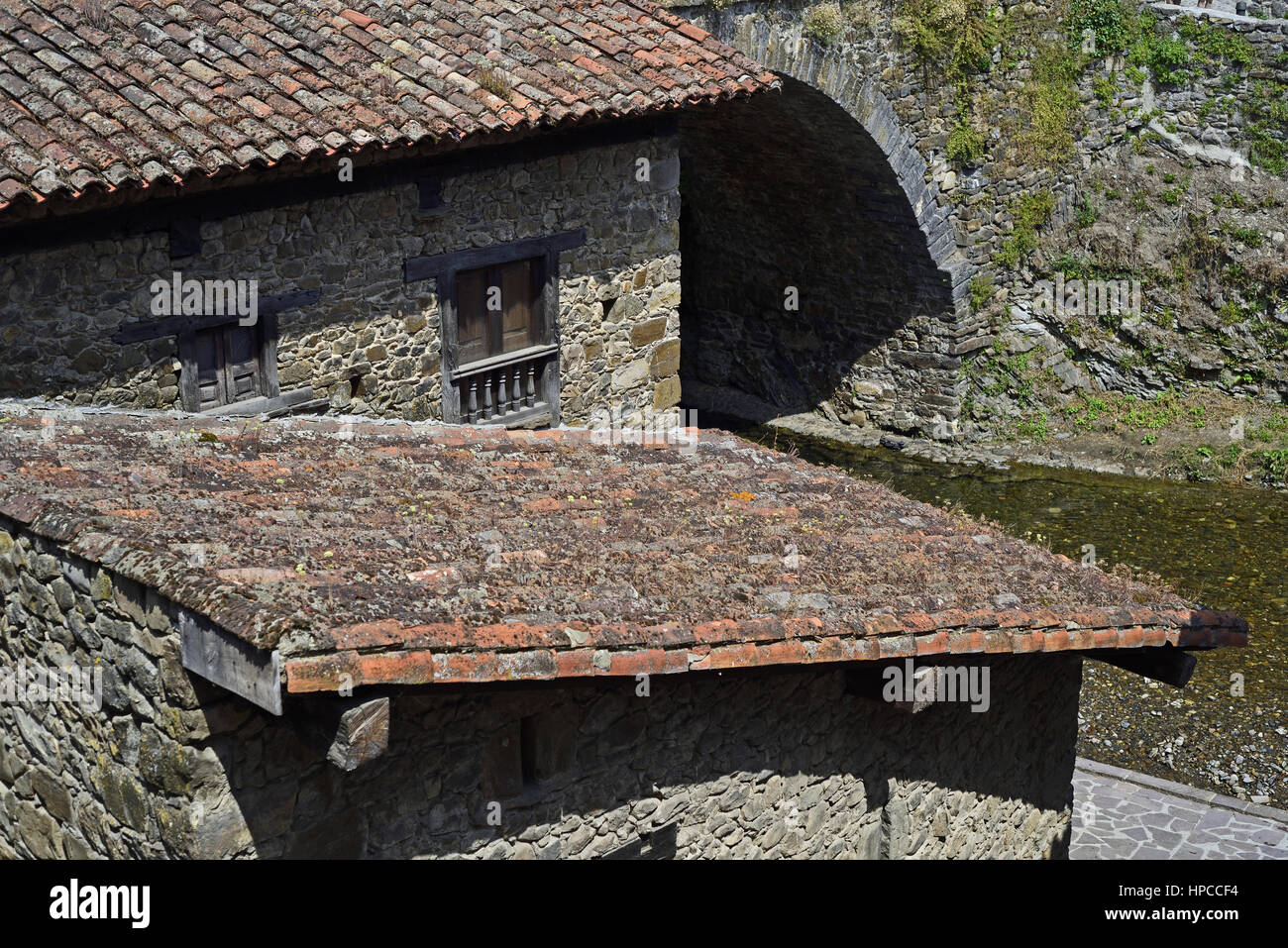 Rooftops of houses by the Rio Deva, Potes, Picos de Europa, Cantabria, Spain Stock Photo
