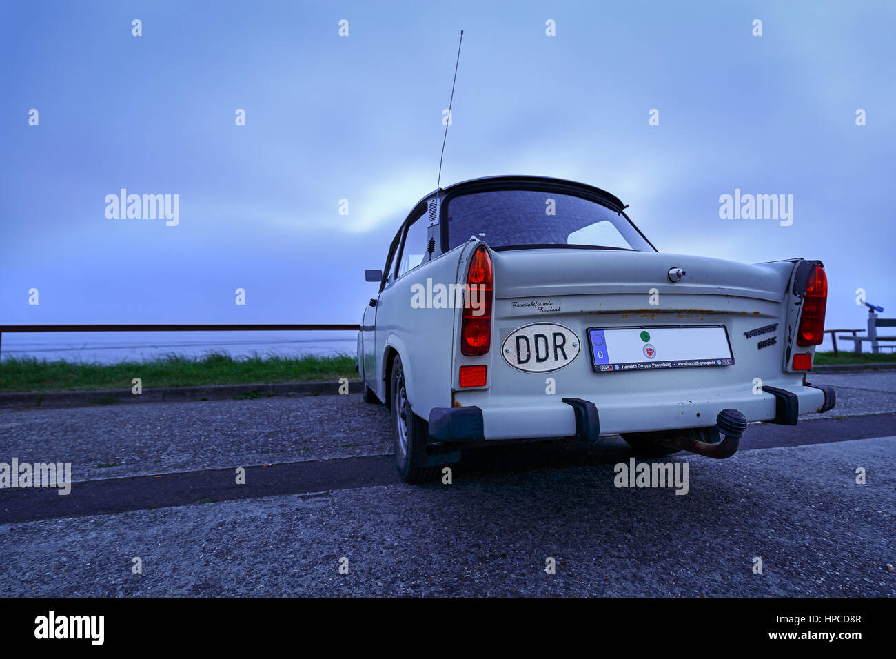 An old Trabant on the coast of Eastfrisia Stock Photo