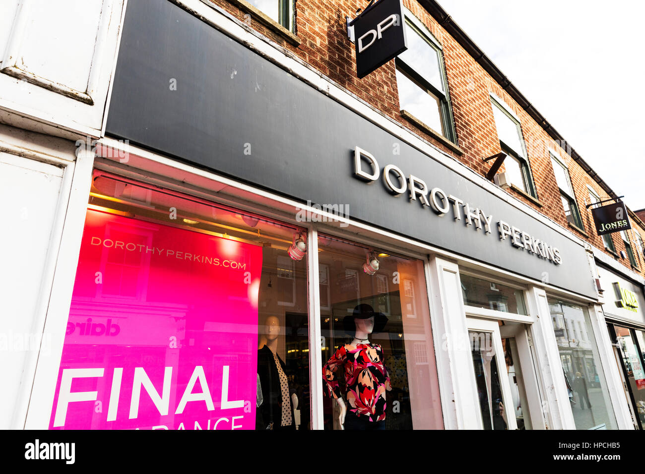 Dorothy Perkins ladies clothes store ladies wear shop UK England sign signs outside shop front exterior models in window Stock Photo