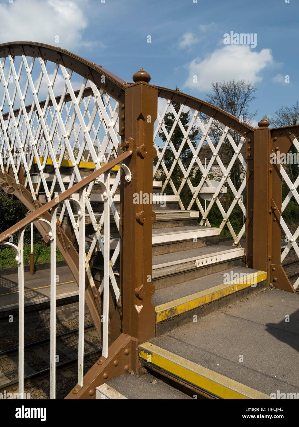 Wrought iron pedestrian railway footbridge, Stamford Railway Station, Lincolnshire, England, UK Stock Photo