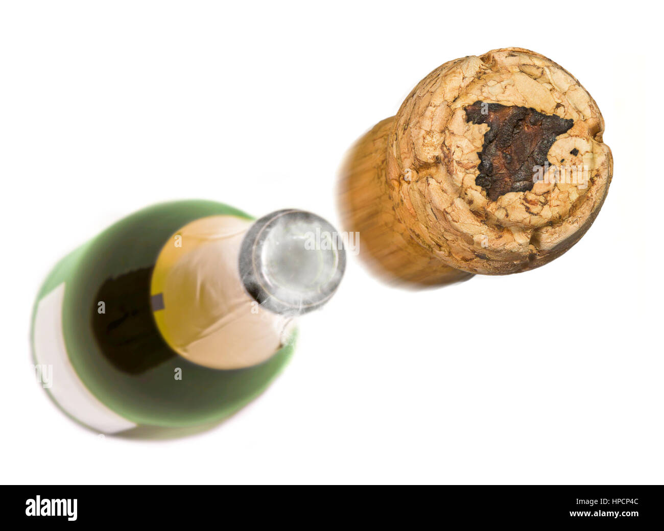 Champagne cork with the shape of Spain burnt in and bottle of champagne in the back.(series) Stock Photo