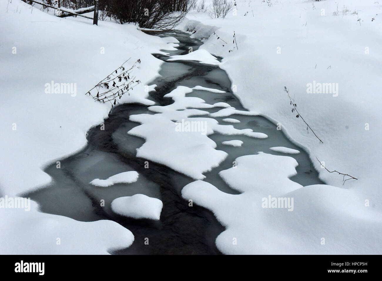 Snow covered river white stones hi-res stock photography and images - Alamy