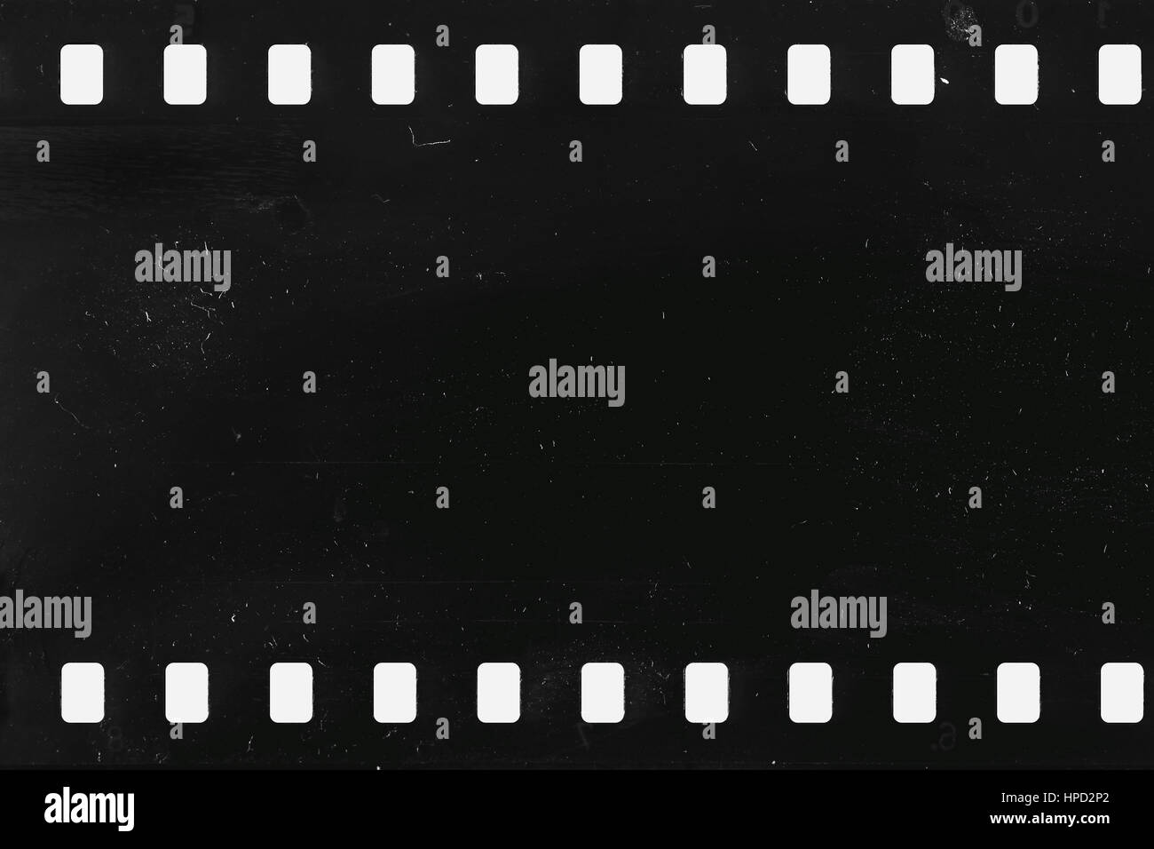Strip of old celluloid film on white background Stock Photo