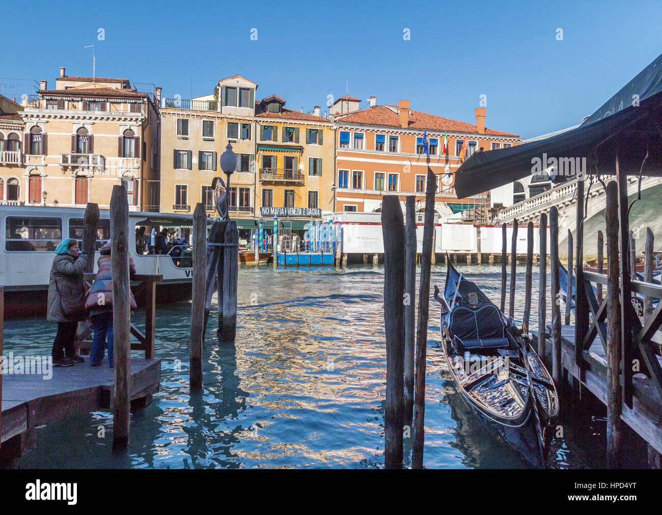 A view of tourists and the Grand Canal in Venice, Italy. Stock Photo