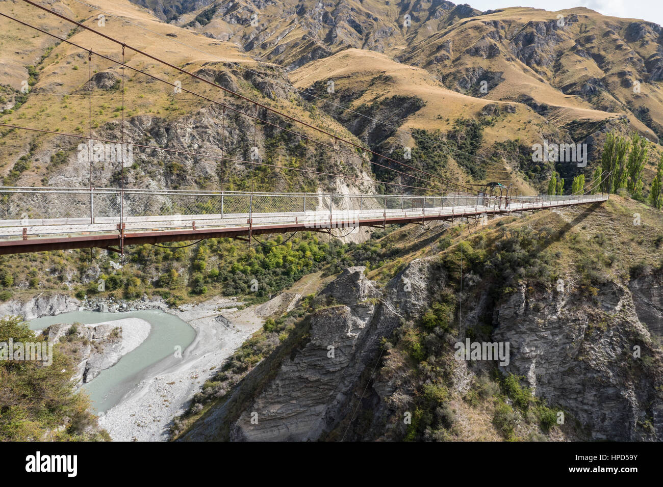 Old suspension bridge spanning Skippers Canyon near Queenstown. South