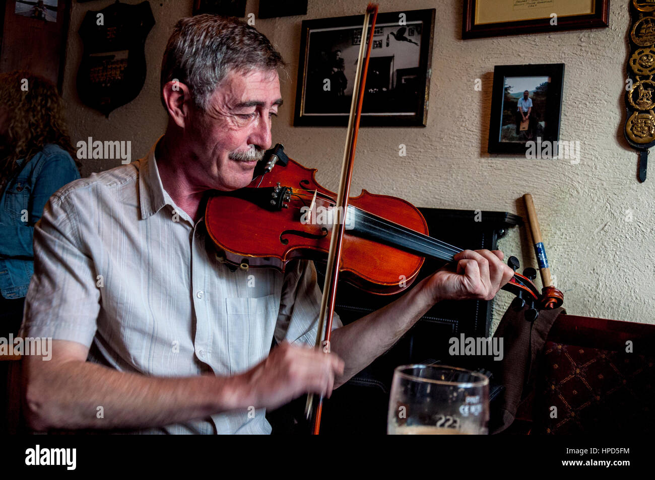 Fiddle or violin player in a bar in Ardara, County Donegal, Ireland Stock Photo