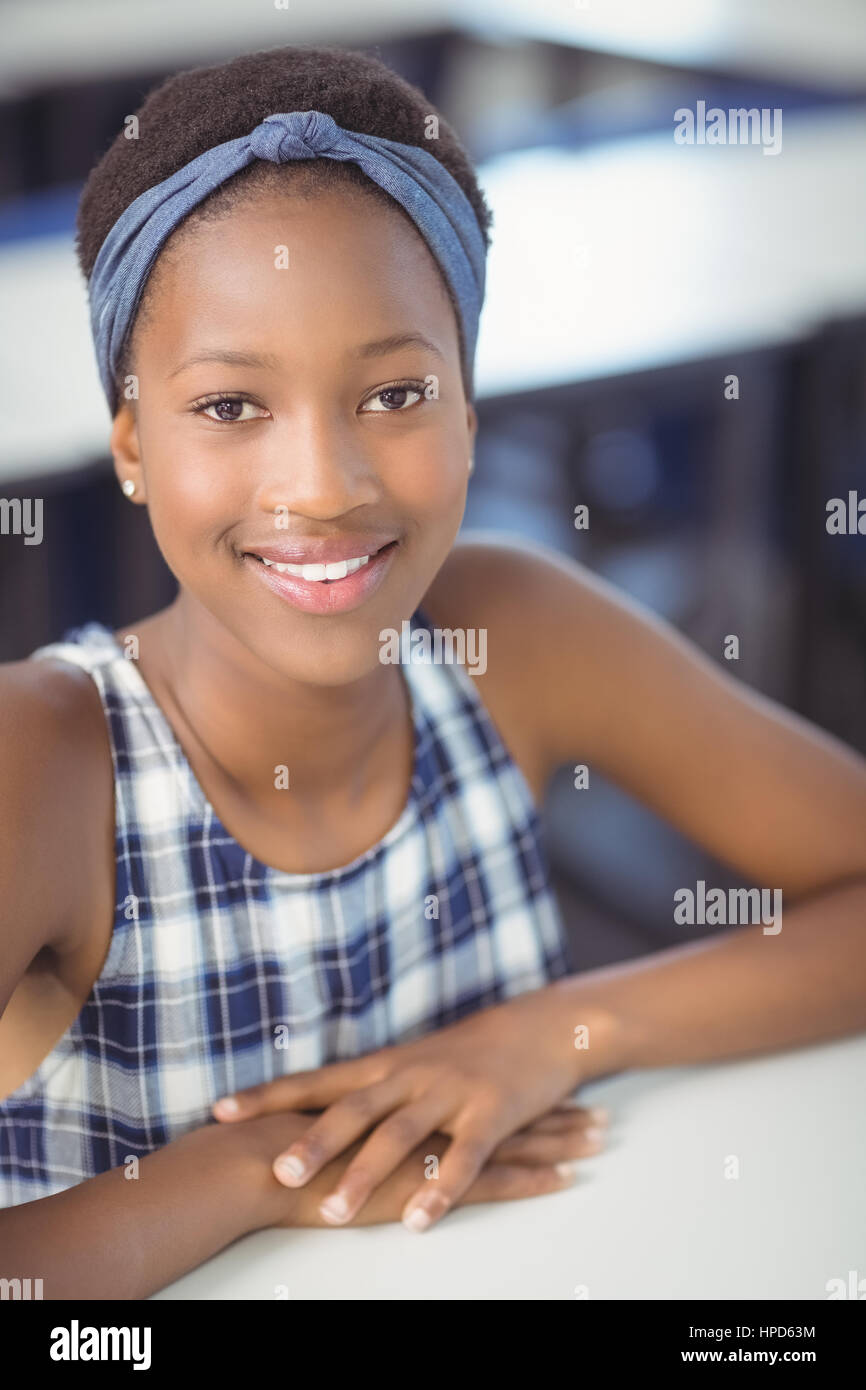 Portrait of smiling schoolgirl in school Stock Photo - Alamy