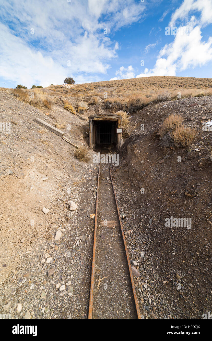Old abandoned gold mine entrance in the Nevada desert near ghost town. Stock Photo