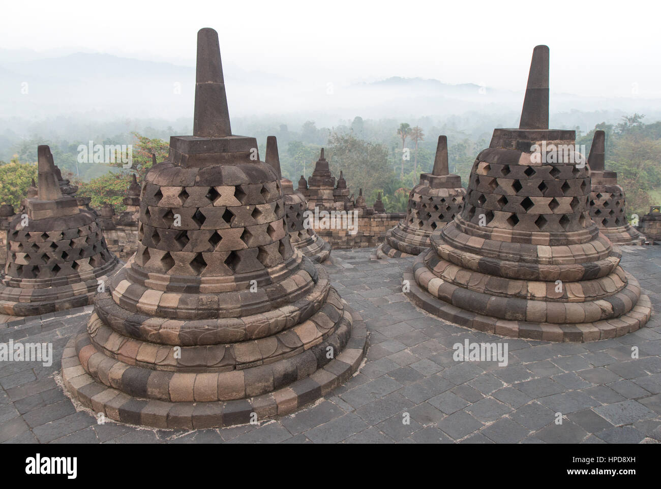 Ancient Borobudur temple at sunrise. Java, Indonesia. Stock Photo