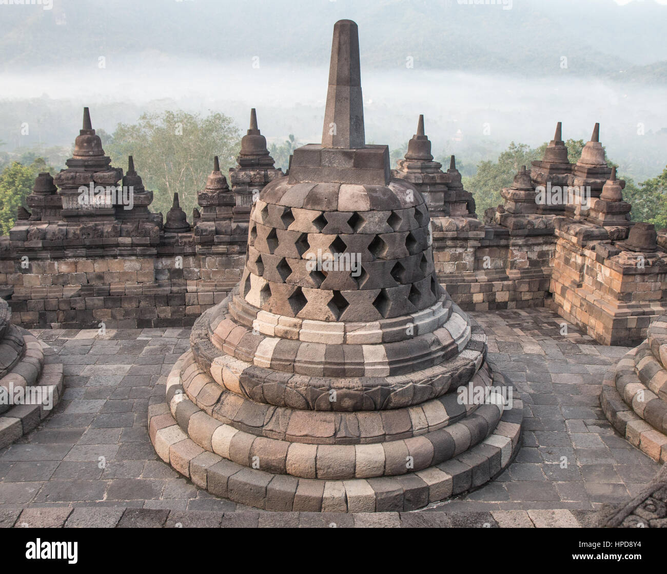 Ancient Borobudur temple at sunrise. Java, Indonesia. Stock Photo