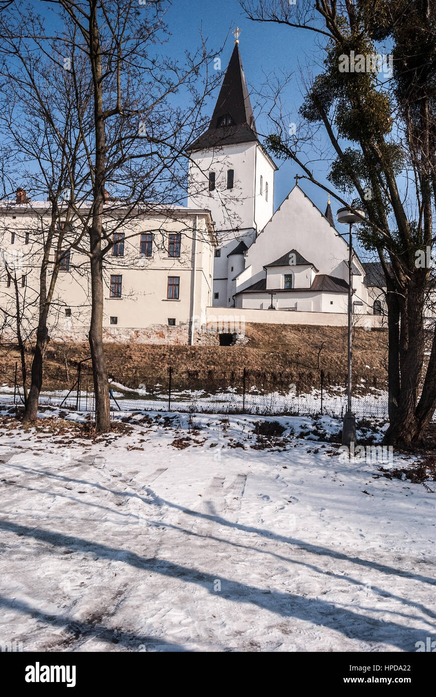 Kostel Povyseni sv.Krize in Karvina - Frystat city in Czech republic near borders with Poland during winter day with snow and clear sky Stock Photo