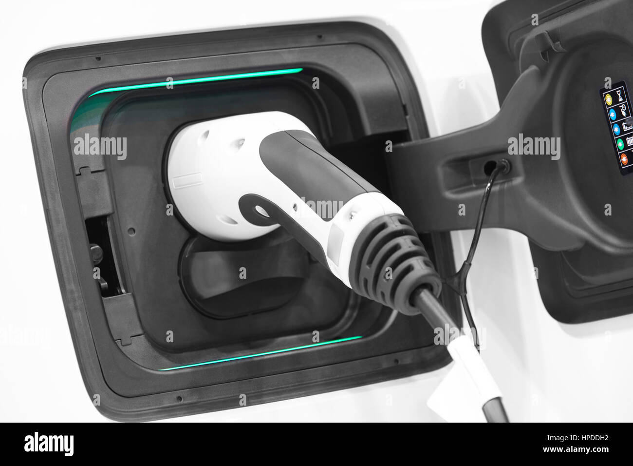 Electric car charging detail. Green and renewable energy technology ...