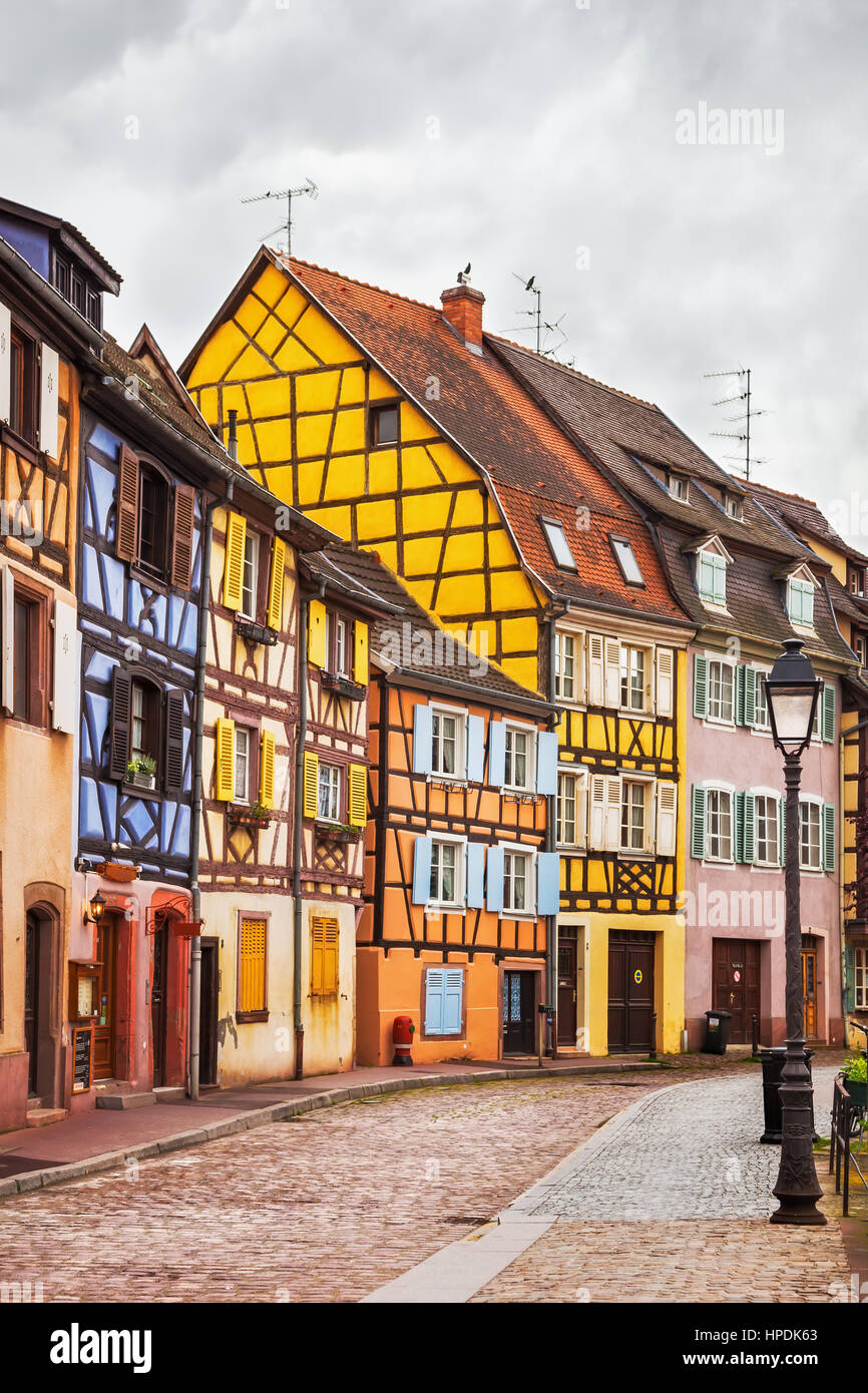 Colmar, Petit Venice, street, lamp and traditional half timbered colorful houses. Alsace, France. Stock Photo