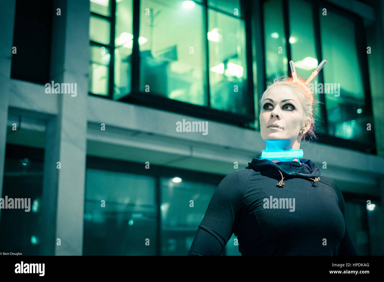 A cyberpunk themed fashion shoot at night Stock Photo