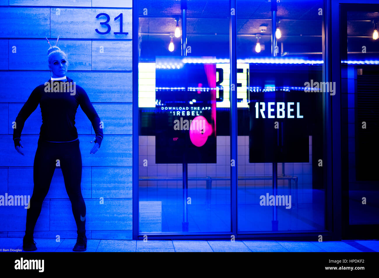 A cyberpunk themed fashion shoot at night Stock Photo