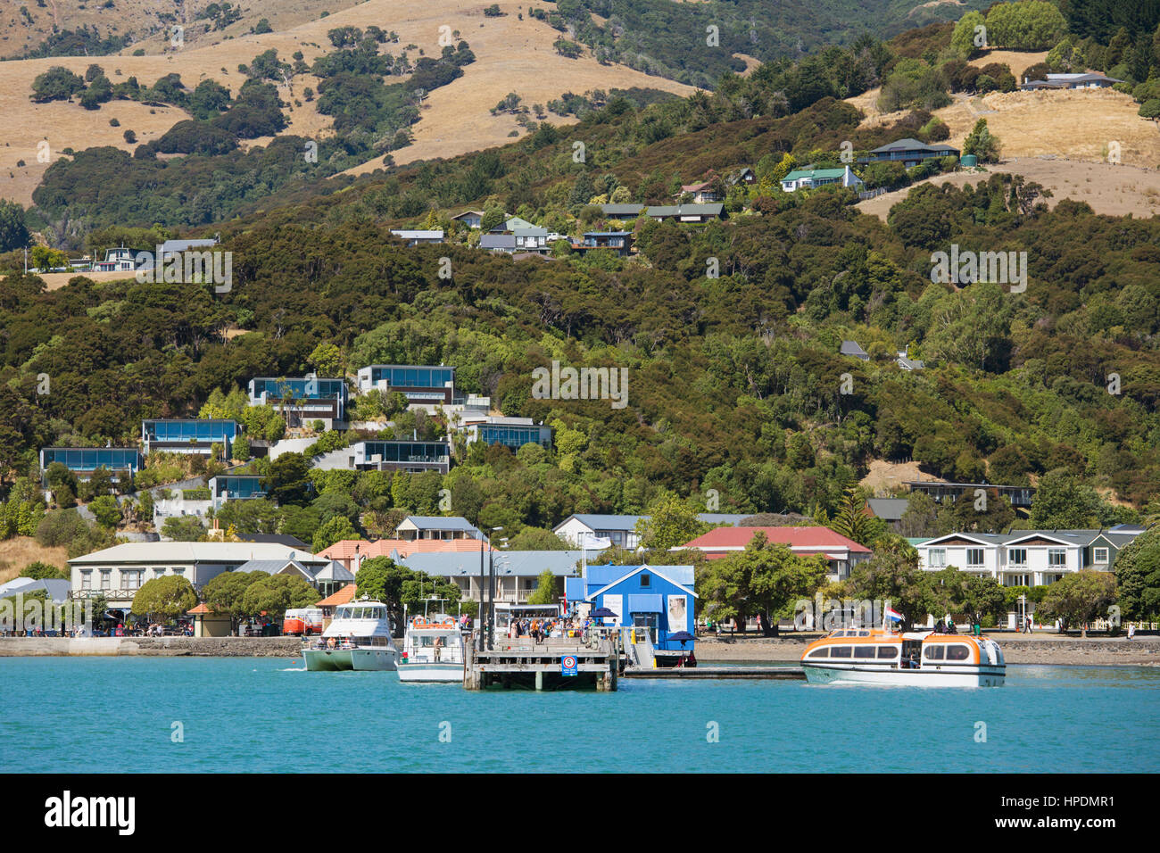 Akaroa, Canterbury, New Zealand. View from Akaroa Harbour to houses on
