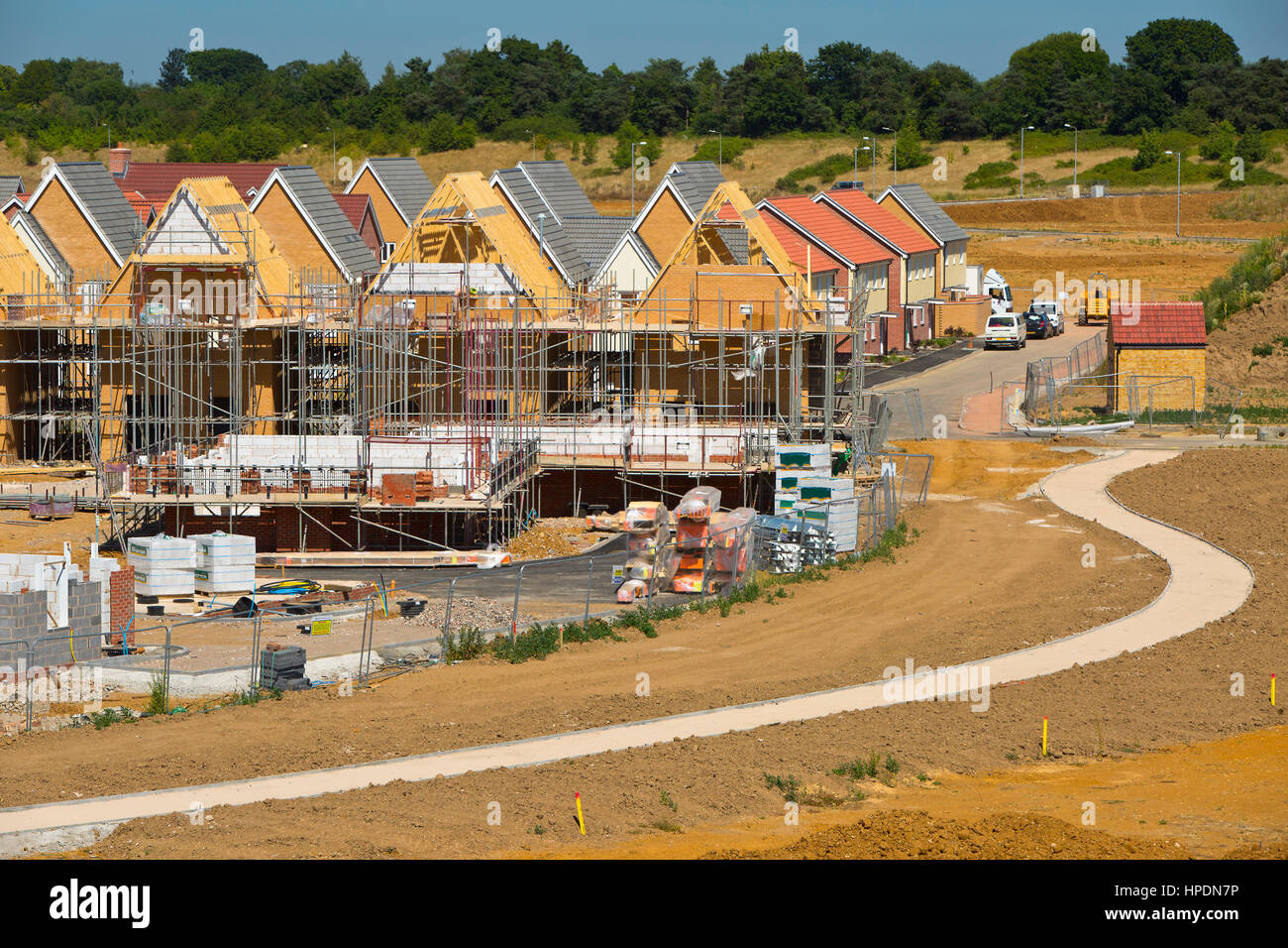 Long lens view of a new greenfield housing development under