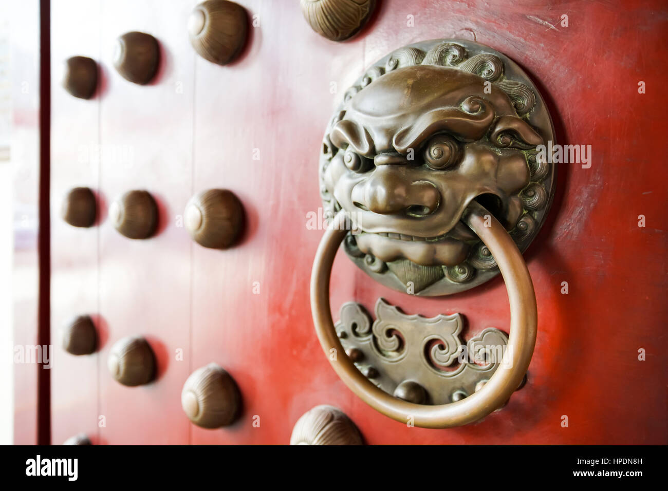 Lion head door knocker, Chinese style knocker in Singapore Stock Photo