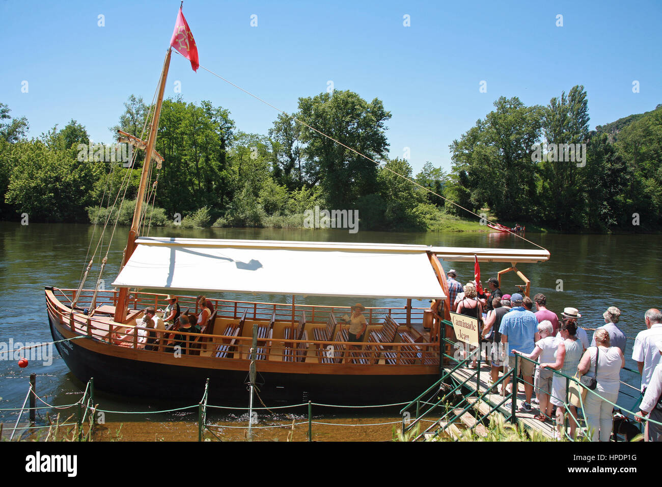 Tourists embarking a boat on the River Dordogne. France Stock Photo