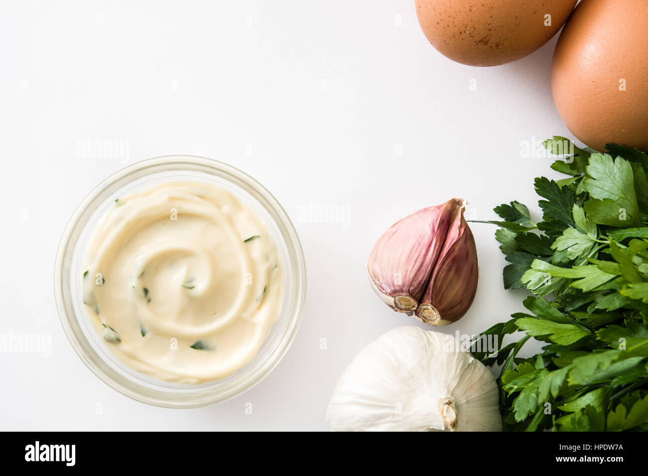 Aioli sauce and ingredients isolated on white background Stock Photo ...