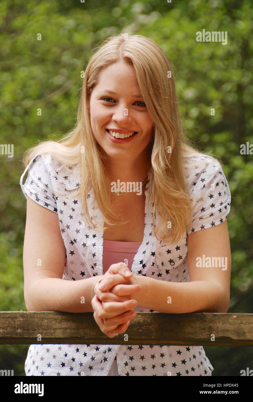 Pretty young woman in a long white dress in The New Forest Stock Photo ...