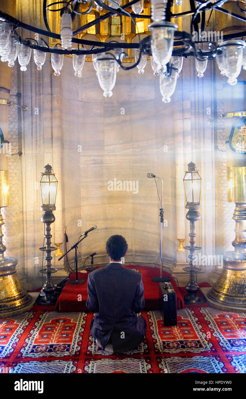 Praying at Yeni Mosque,Mihrab, Istanbul, Turkey Stock Photo