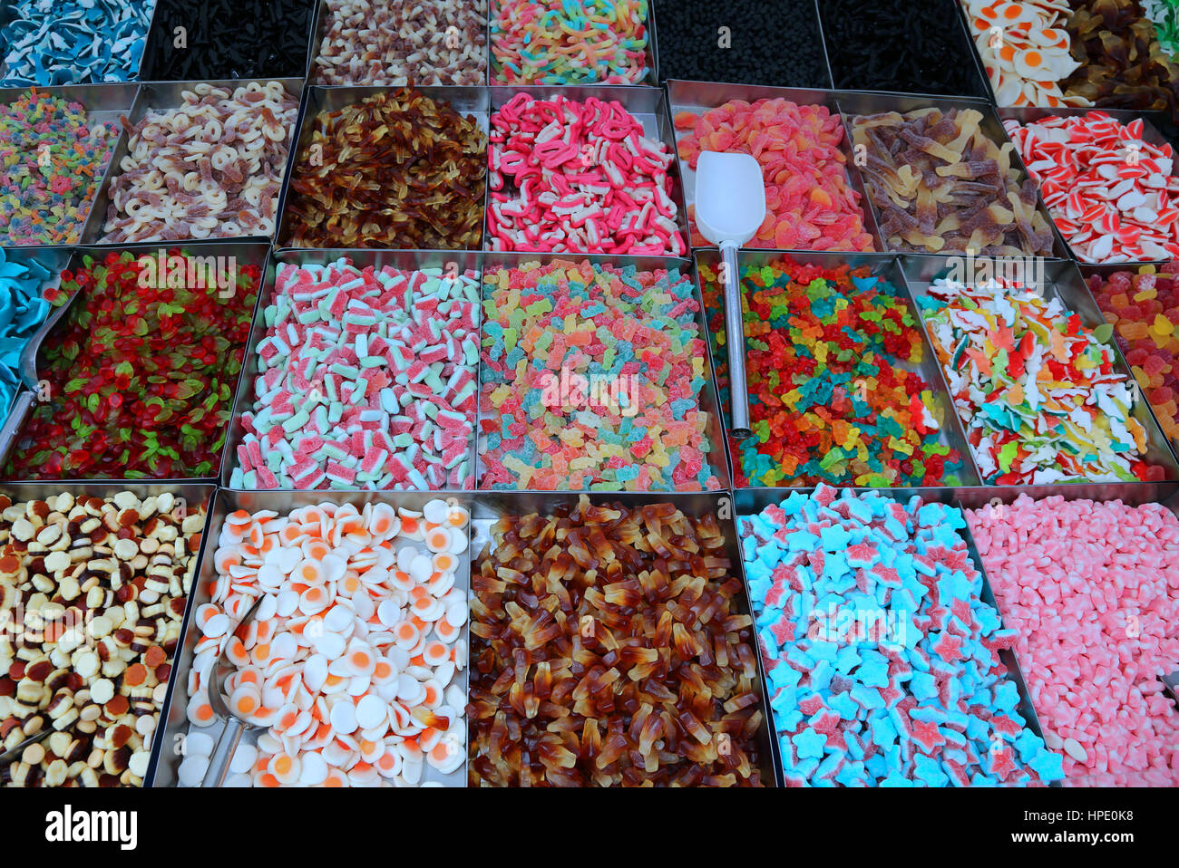 sugar candy on sale in market stall during the village festival Stock Photo