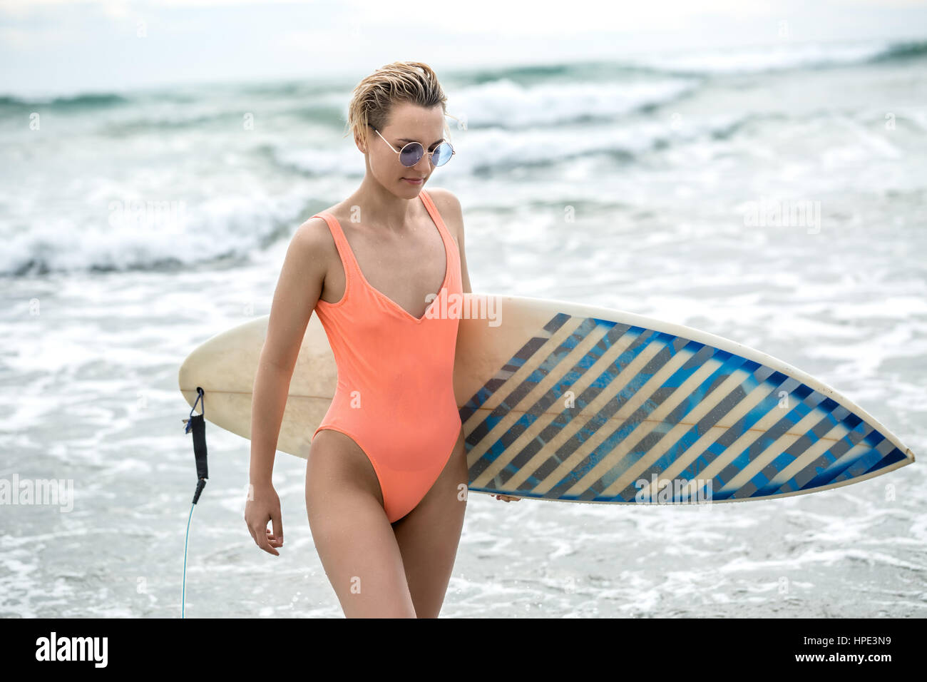 Thoughtful Blonde Girl With Short Hairstyle And Closed Eyes Stands On Stock Photo Alamy