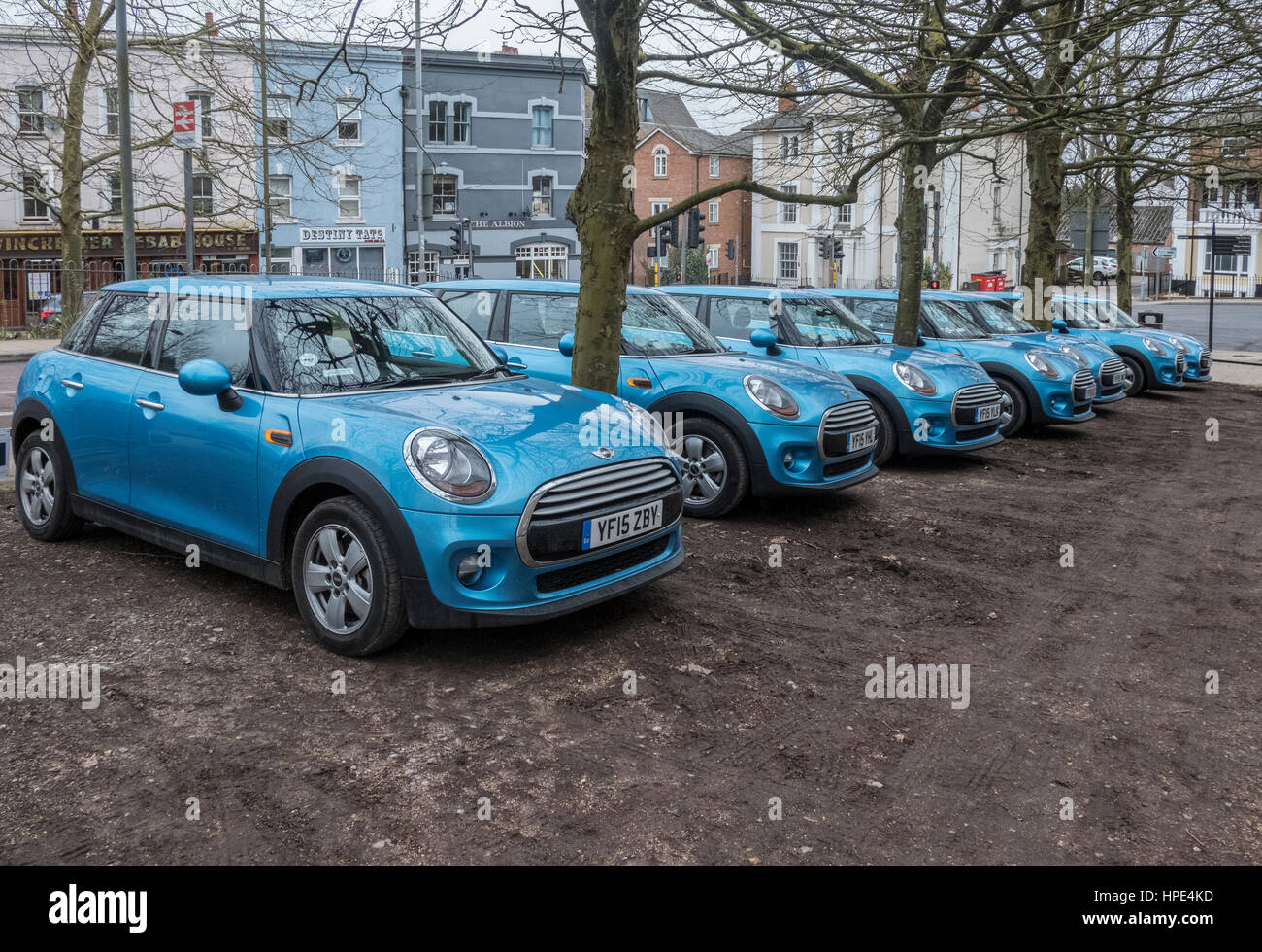 Row of blue mini cars in Winchester Hampshire Stock Photo Alamy