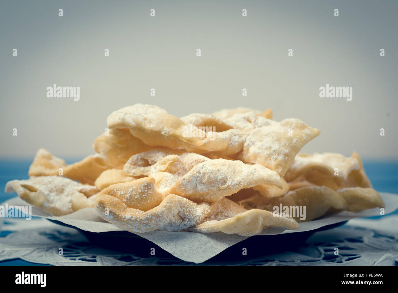 Traditonal angel wings cookies, faworki on the plate Stock Photo