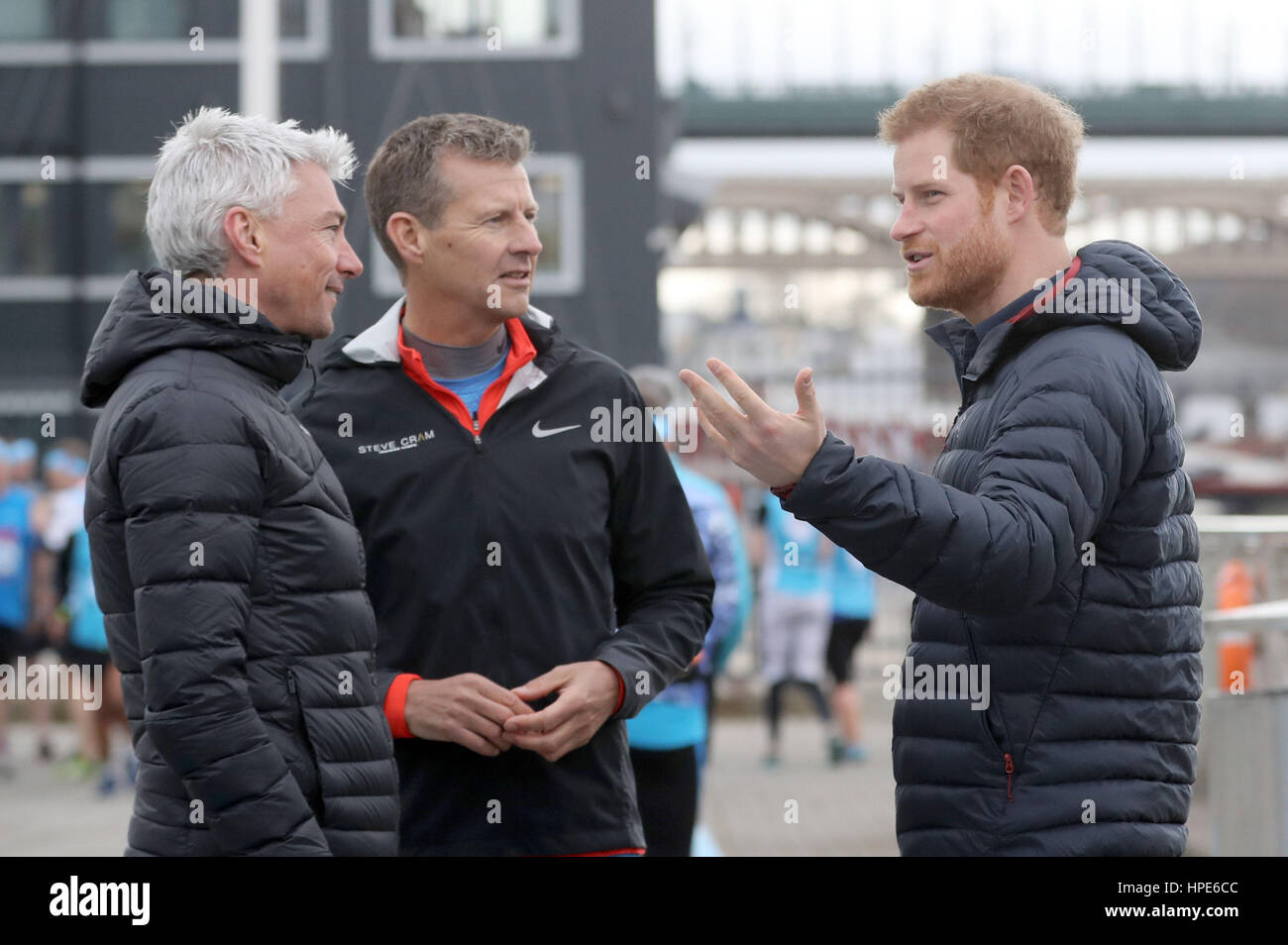Prince Harry at the Quayside in Gateshead with Steve Cram and Jonathan Edwards as they train runners taking part in the London Marathon for mental health charity Heads Together. Stock Photo