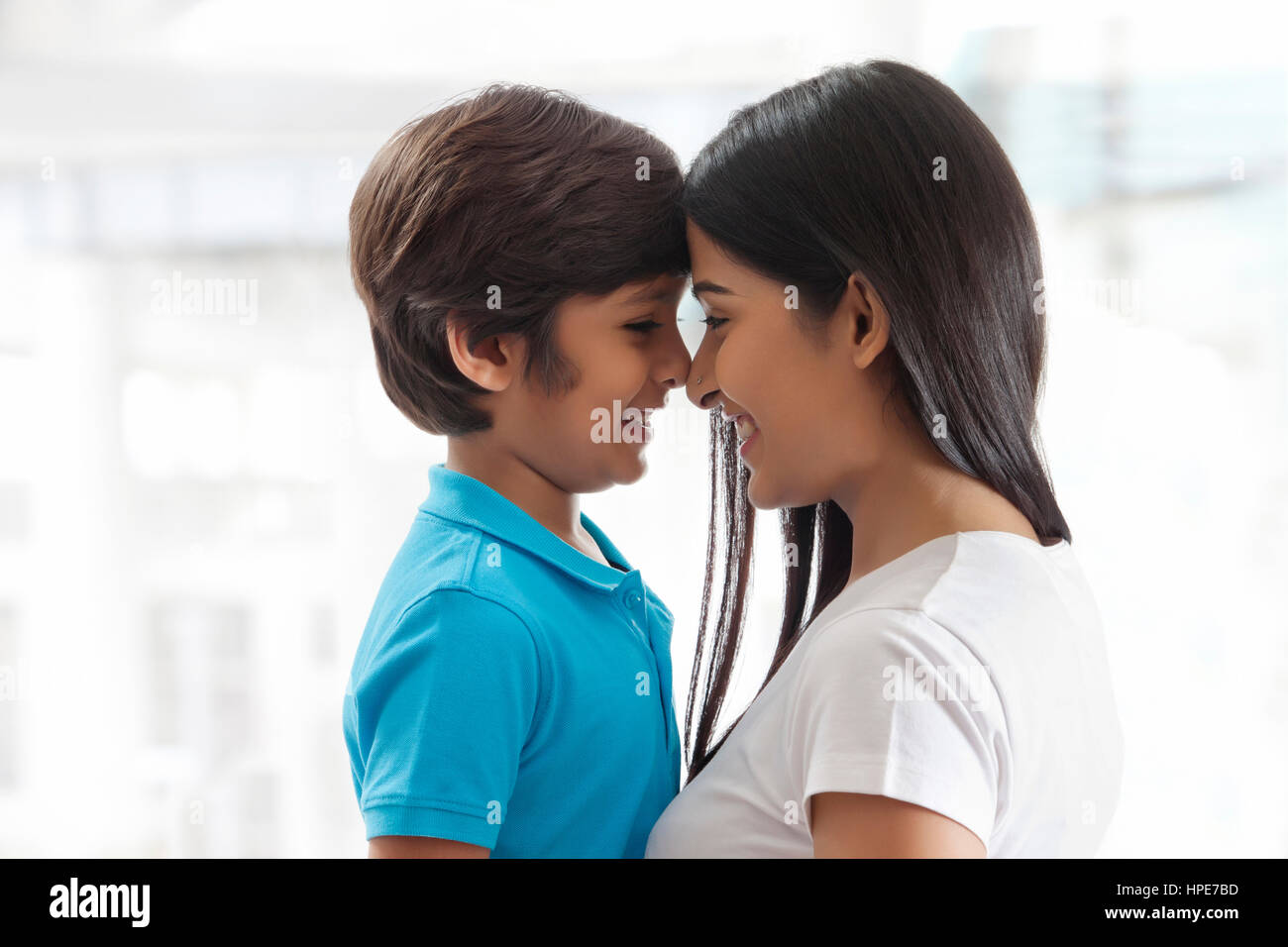 Mother and son rubbing noses together Stock Photo