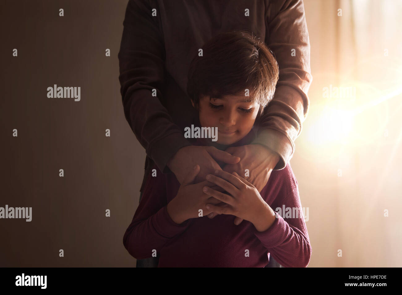 Two boys holding hands hi-res stock photography and images - Alamy