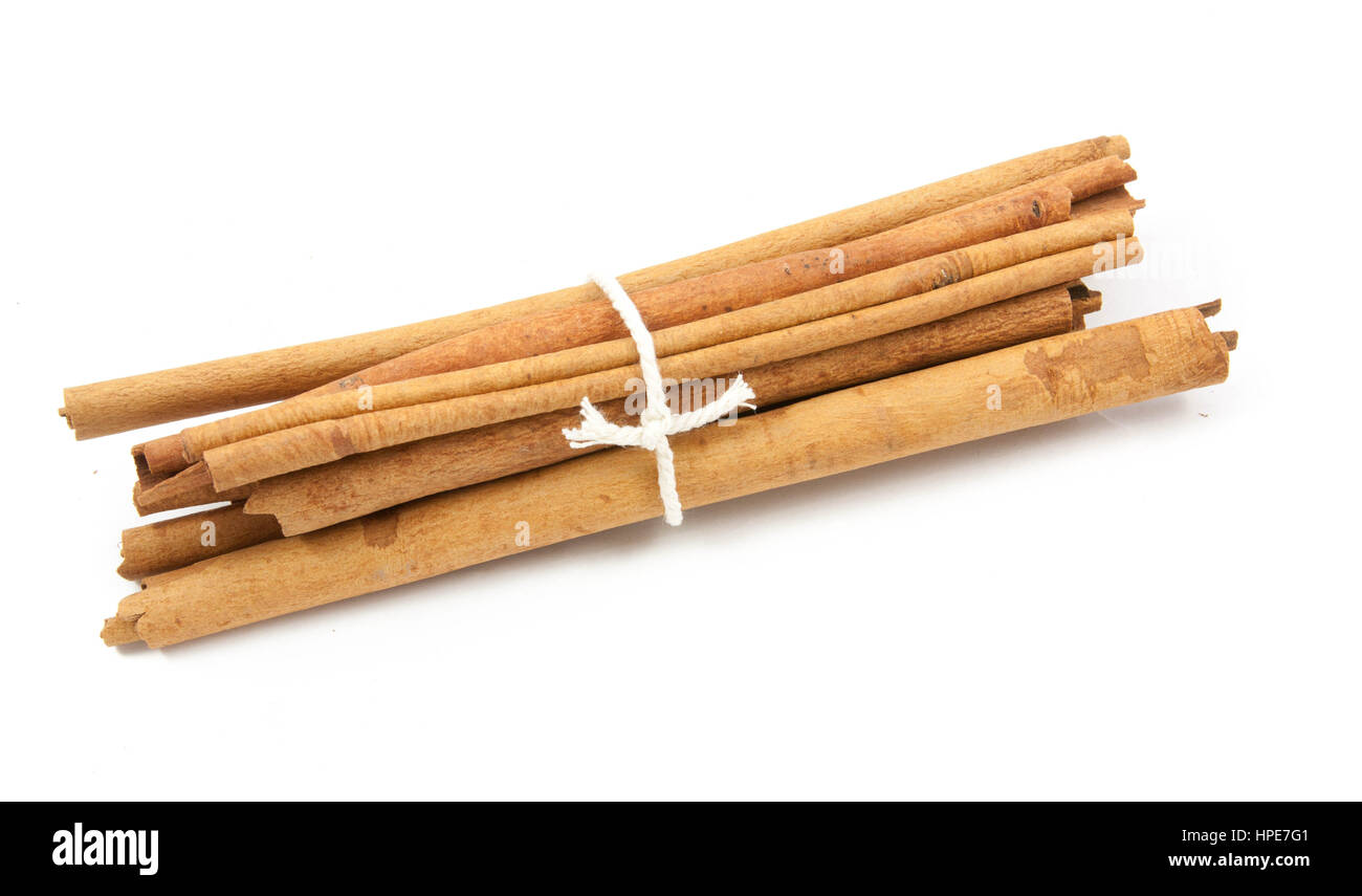 cinnamon ingredients close up isolated on white background Stock Photo