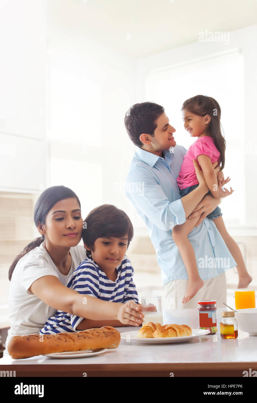 Family at breakfast table Stock Photo - Alamy