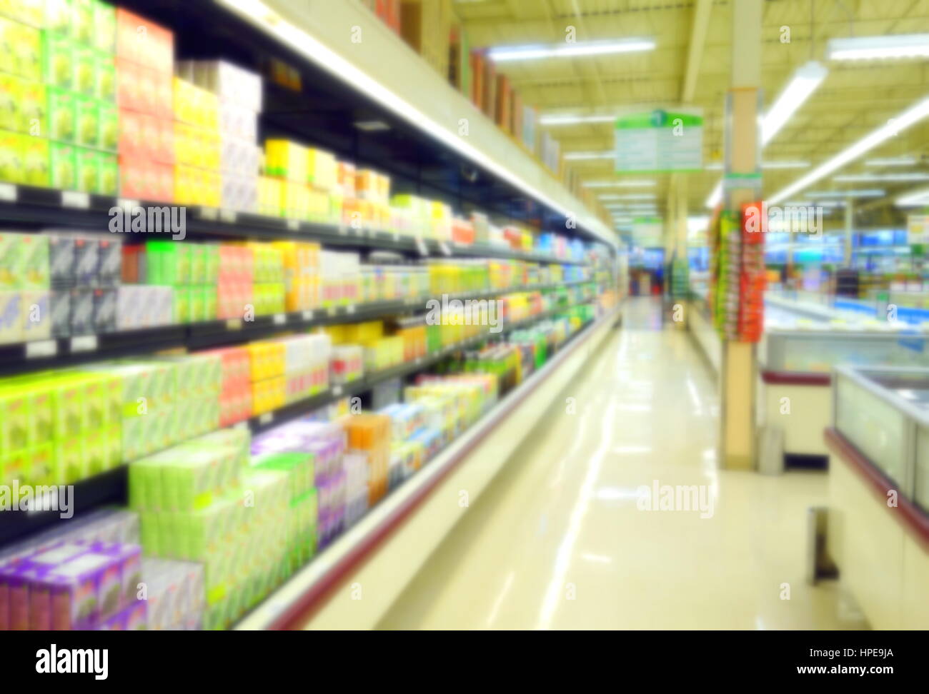 Blurred supermarket shelves Stock Photo