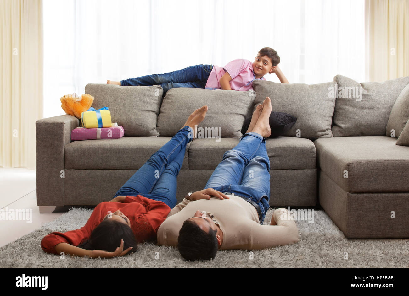 Young couple sleeping on sofa hires stock photography and images Alamy