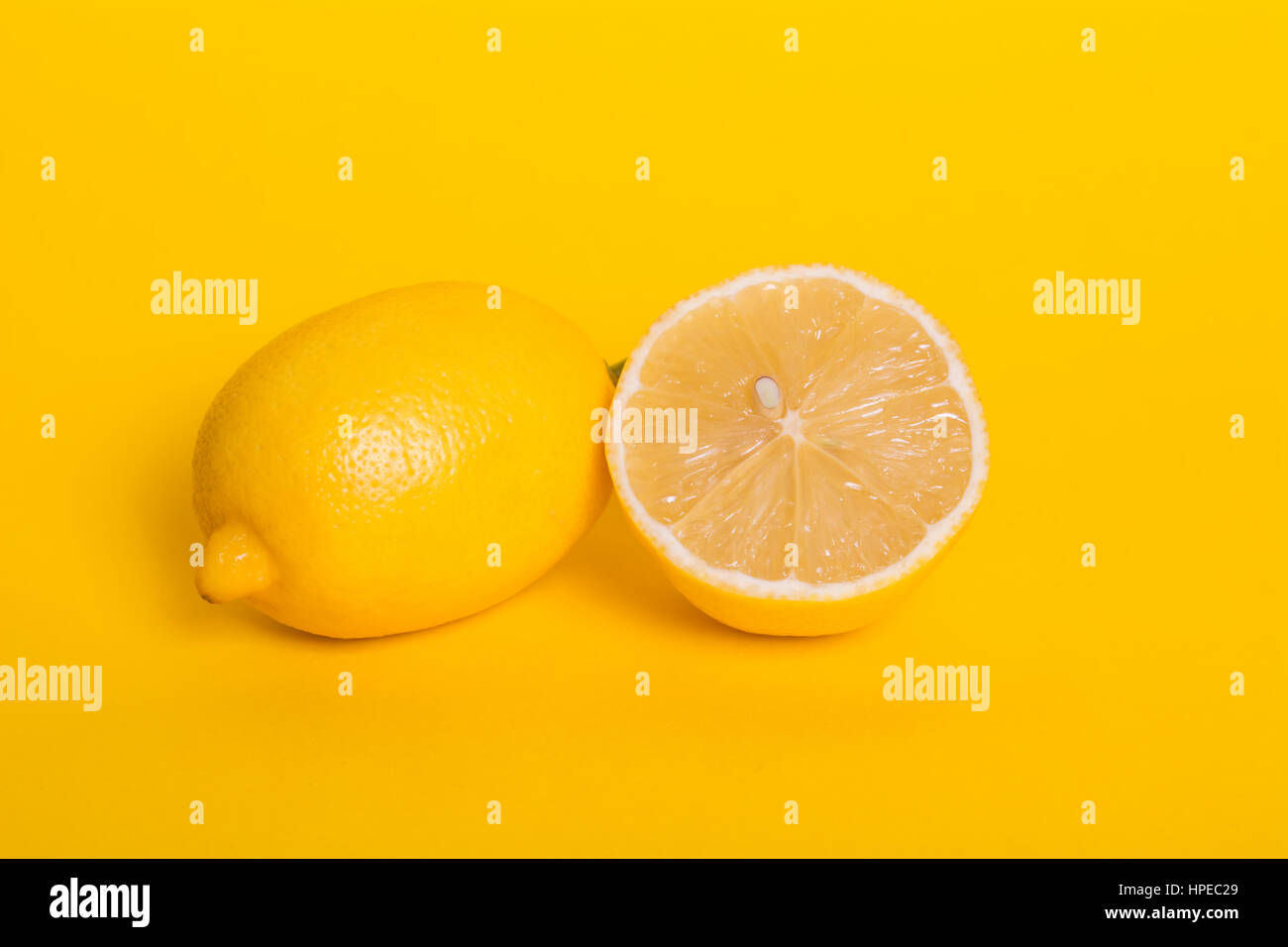 Lemon And Half A Lemon On A Yellow Background Stock Photo Alamy lemon-and-half-a-lemon-on-a-yellow-background-stock-photo-alamy