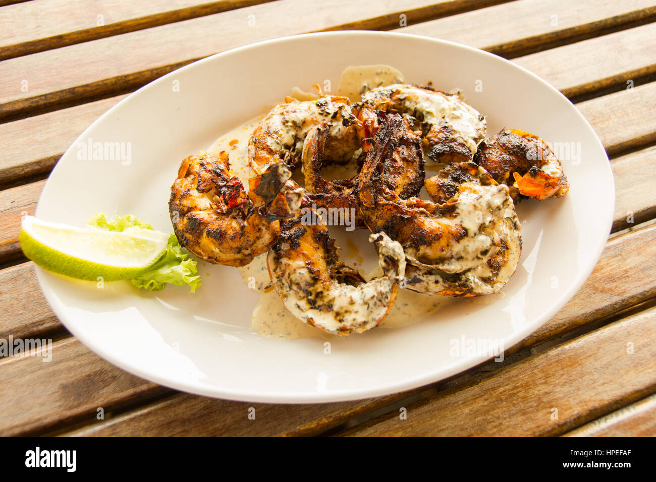 Spiny Lobster covered in Hollandaise sauce Stock Photo Alamy
