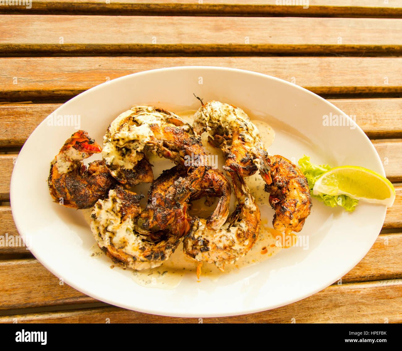 Spiny Lobster covered in Hollandaise sauce Stock Photo Alamy